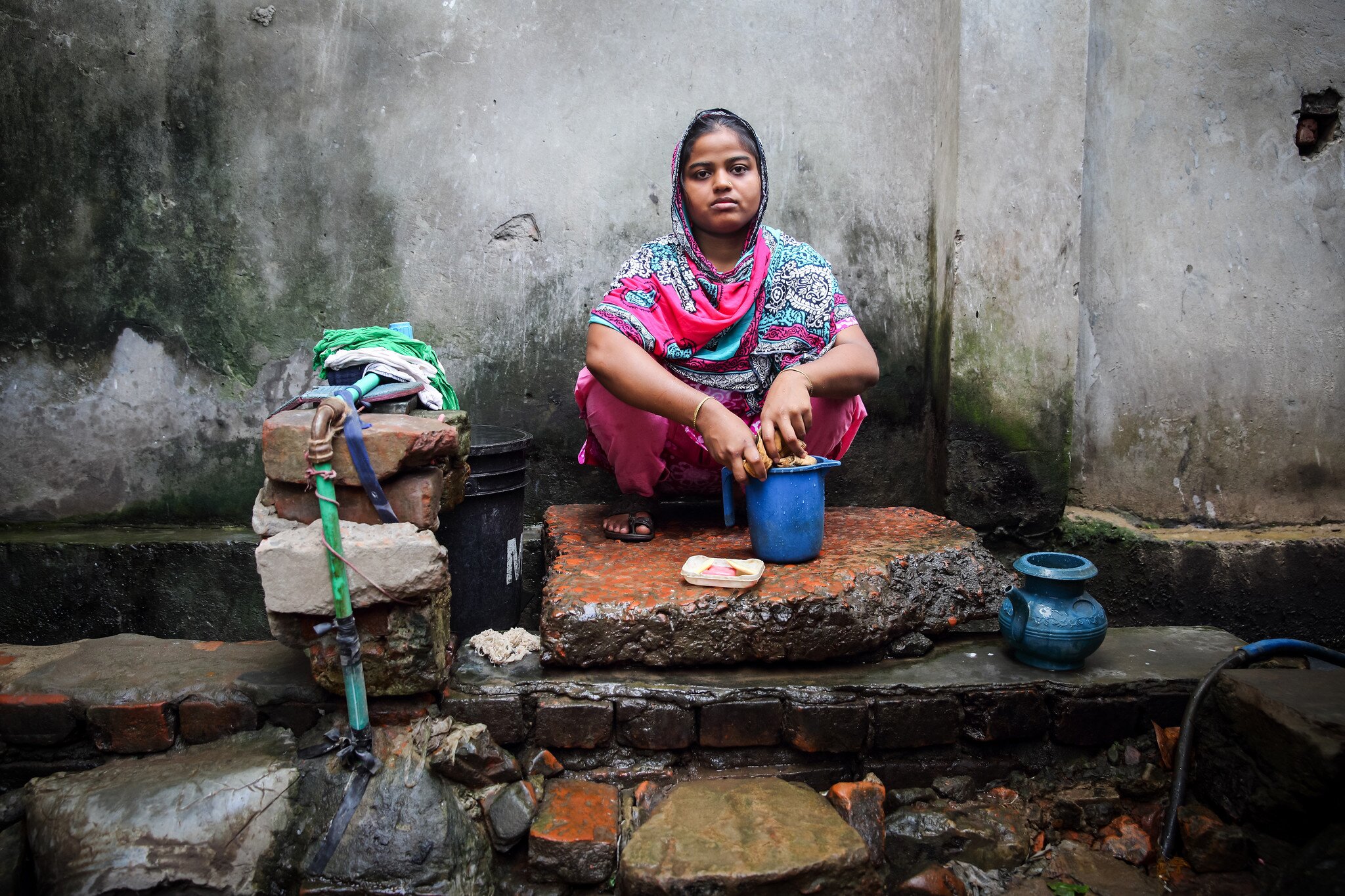 Rasheda and her children at home